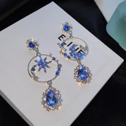 Glittering Star And Moon Drop Earrings